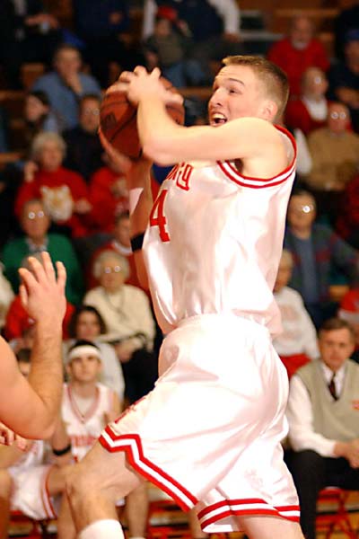 Peter Walker takes the ball to the basket in a win over Wabash.